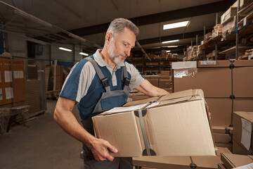 Attentive male person checking the number of order