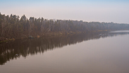 Top view of the countryside, river, lawn, trees. Nature conservation.