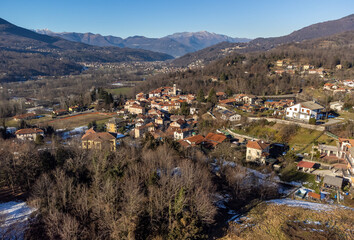 Fototapeta na wymiar Aerial view of small Italian village Ferrera di Varese at winter season, situated in province of Varese, Lombardy, Italy
