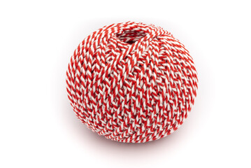 A ball of red and white cord. Decorating thread.
