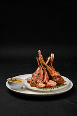 Grilled rack of lamb on a plate
