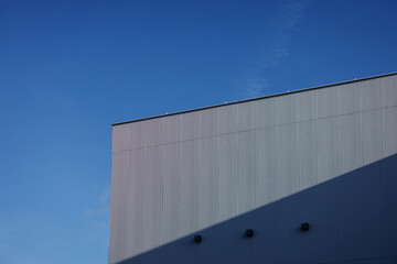 building over blue sky background