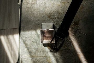 Perfume with leather belt