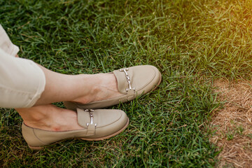  leather loafers on grass