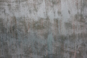 Obraz premium Old light blue gray painted weathered concrete wall abstract background texture