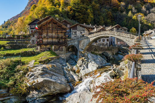 The beautiful village of Rassa, during fall season, in Valsesia (Sesia Valley). Province of Vercelli, Piedmont, Italy.