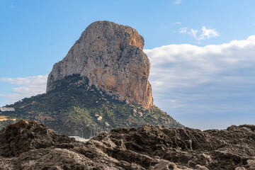 Peñon de Ifach in Calpe, on a morning with sun and clouds.