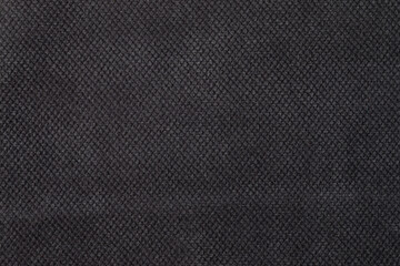 The texture of the fabric. Dark grey jacquard close-up. Soft expensive fabric for furniture,...