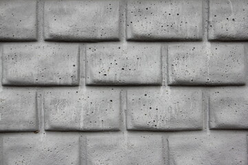 Old dry grey brick wall background texture