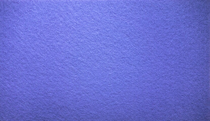 The texture of a blue felt fabric. Purple wool background. Soft fabric background for text.