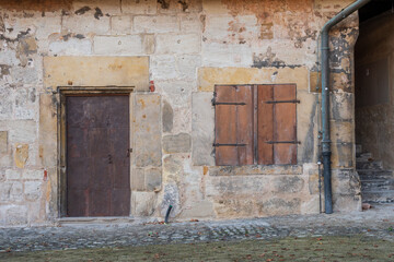 Old door and window of an ancient house 