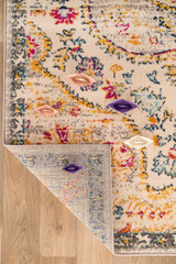 paper ship on carpet fold.