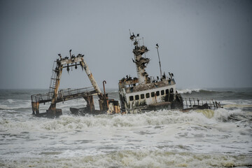 Fototapeta na wymiar Sunk Shipwreck on the Skeleton Coast in Namibia