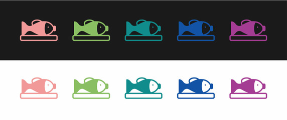 Set Served fish on a plate icon isolated on black and white background. Vector