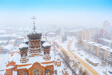 Aerial drone view of Vvedenskaya church in the city of Ivanovo. Russia in winter with snow