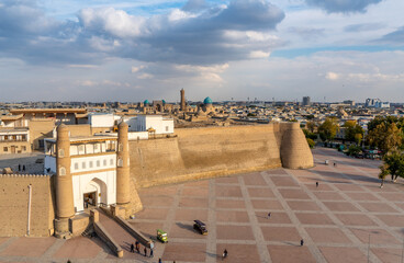 Uzbekistan, Bukhara, the Ark of Bukhara, with his atypic walls  is a massive fortress in the historical center of the city. - obrazy, fototapety, plakaty