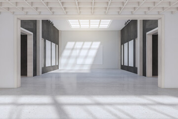 Bright concrete exhibition hall interior with empty posters and sunlight. Gallery concept. 3D Rendering.
