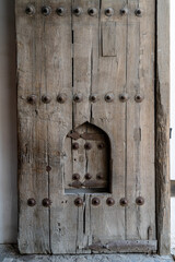 Uzbekistan, old wooden doors in the historical center of Bukhara.