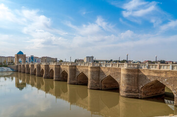 Fototapeta na wymiar Uzbekistan, in the city of Qarshi (Karchi), the old Nicolayev Bridge in October