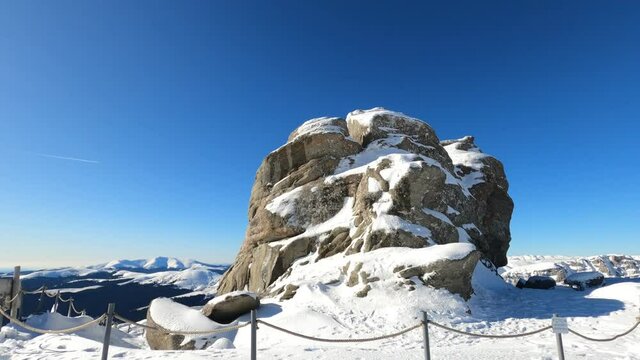 A timelapse approach to the Sphinx in snowy Bucegi Mountains, Romania