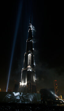 Burj Dubai tower, the world's tallest skyscraper, is lit by laser lights during its opening ceremony in Dubai