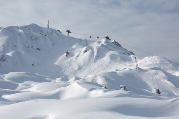 Mountain skiing slopes, snowy Alpine landscape