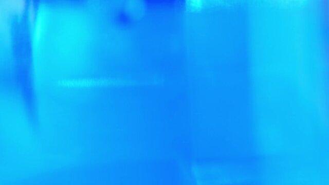 Beautiful blue abstract background. Transparent object in motion.