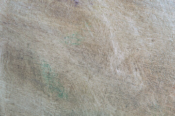 abstract faded multicolored background resulting from washing off paints from canvas, short focus. Not an art object, temporary effect.