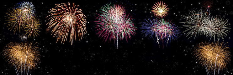 Colorful holiday festival celebration fireworks in Happy New Year 2022 with blank copy space for banner.