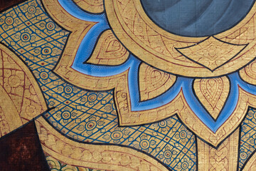 Fototapeta na wymiar Ancient Thai pattern on wall in Thailand Buddha Temple , Asian Buddha style art.