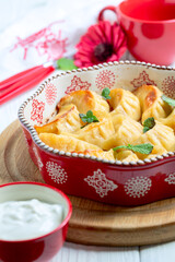 Baked dumplings with cottage cheese.