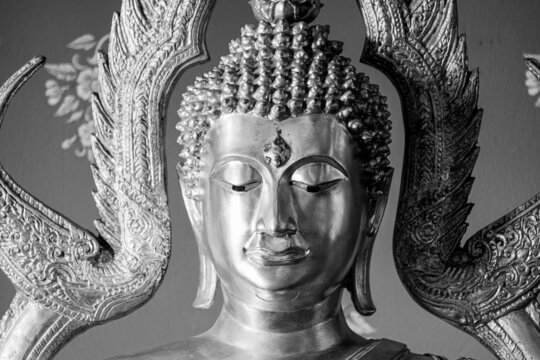 Close up of Buddha beautiful serene face. Buddha images in Thailand that Buddhists respect.
