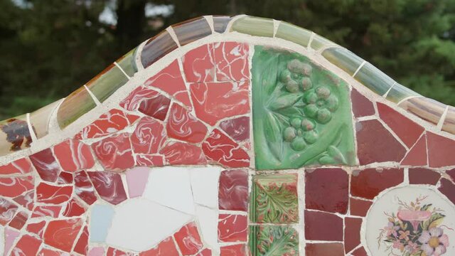Colorful Tiled Mosaic Bench At The Main Entrance Of Park Guell In Barcelona, Spain. - close up, slider