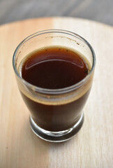 a cup of arabica coffee ready to be enjoyed with a blur background