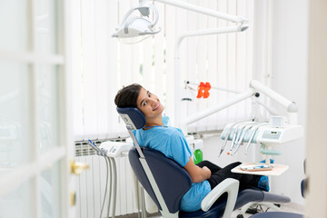Visiting friendly and professional dentist. high quality photo 