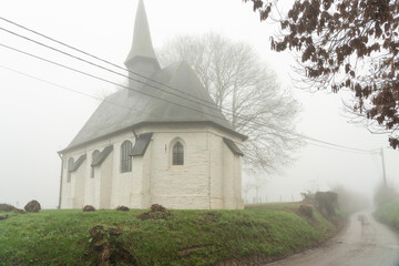 Desert Chapel in Gooik whit fog