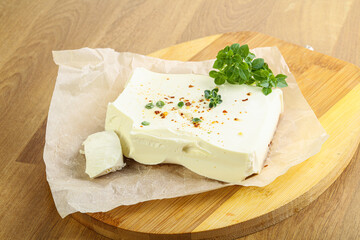 Greek Feta cheese over board