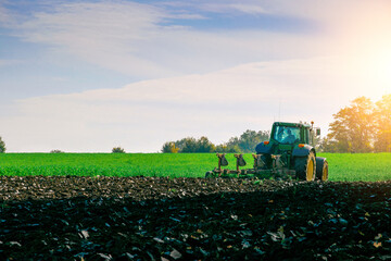 Tractor farm. Agriculture farm machinery on landscape land field. Farmer machine equipment for crop. Tractor farm fields concept.