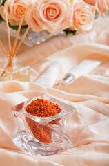 Spa set: scented candle, sea salt, liquid soap and romantic roses