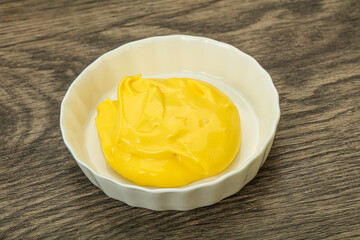 Natural cheese sauce in the bowl