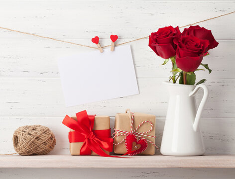 Valentines day card with gifts and flowers