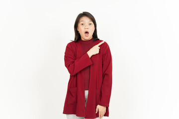 Pointing Product Aside Of Beautiful Asian Woman Wearing Red Shirt Isolated On White Background