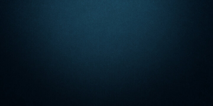 Dark blue background texture with black vignette in old vintage grunge textured border design, dark elegant teal color wall with light spotlight center
