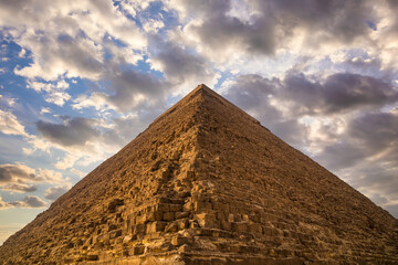 Fototapeta na wymiar Great Pyramid of Cheops at sunset. Giza, Cairo, Egypt.