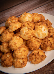 Rocher coco from coconut dessert in brown color make with white eggs and sugar.