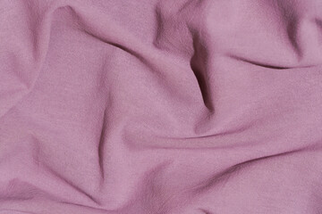 Fabric cotton background. Folds, texture and draperies on the surface textile of garment warp, upholstery and design