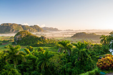 Fototapeta Limestone outcrops named Mogotes at Viñales Valley in near the western end of the island of Cuba is a beautiful karst landscape encircled by mountains obraz