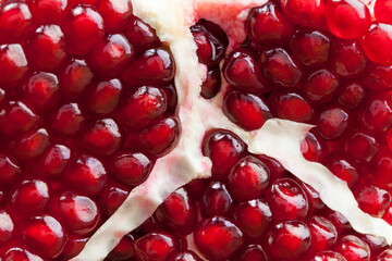 broken into pieces ripe red pomegranate