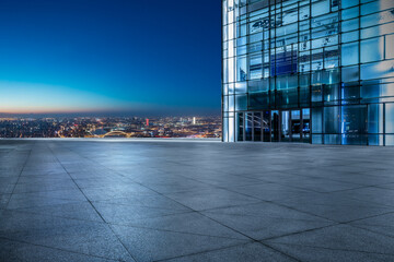 Panoramic skyline and modern commercial office buildings with empty road. empty square floors and cityscape.