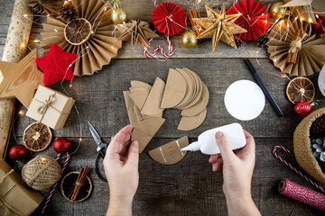 Do-it-yourself step-by-step instructions for a Christmas tree made of paper. Eco-style Christmas decor. Step 15